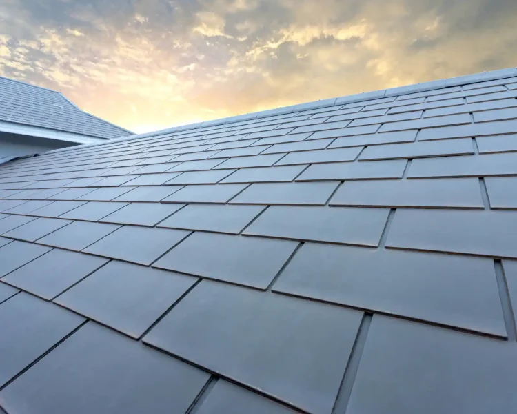 bigstock-Slate-Roof-Against-Blue-Sky-G-306061447